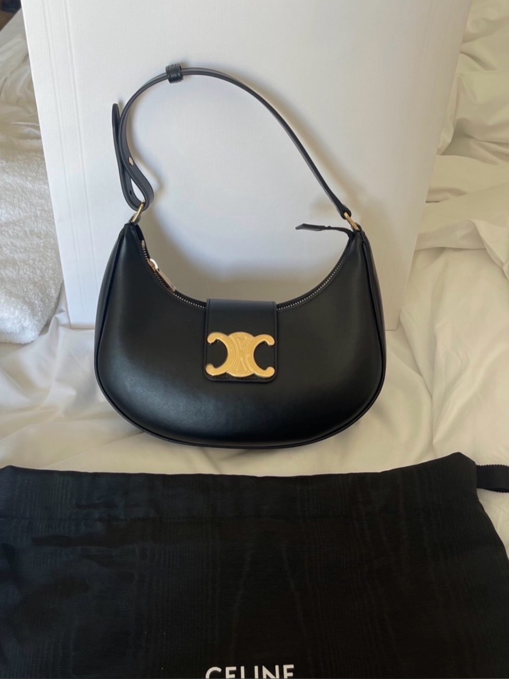 A10 Black Leather Crescent Shoulder Bag with Gold Triomphe Hardware